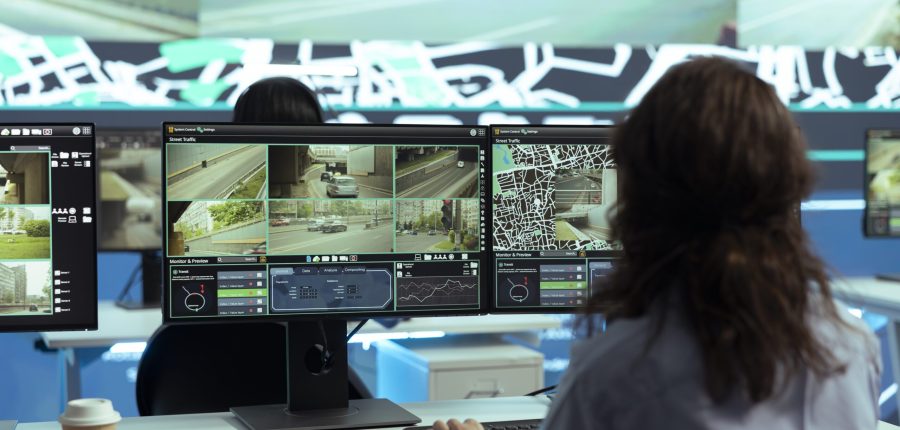 Call center employee providing shipment information via gps satellite navigation for their clients, ensuring fast delivery and order tracking service. Operator monitoring traffic for the couriers.