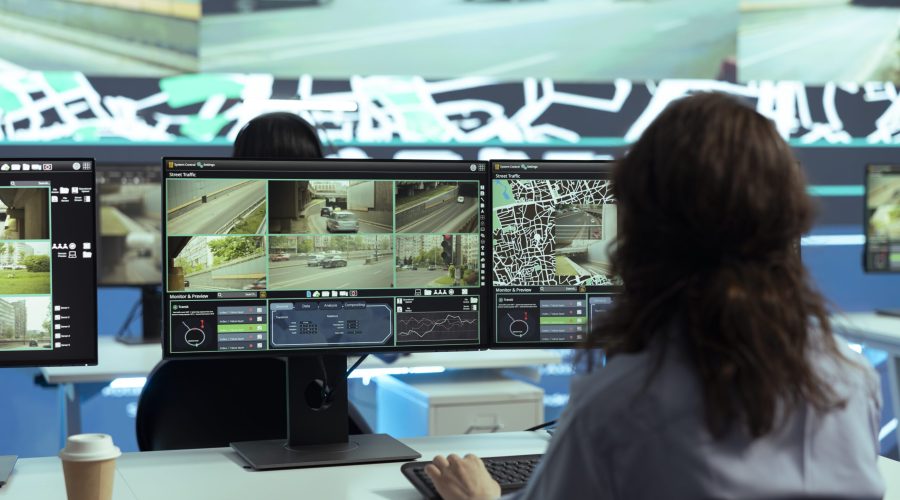 Call center employee providing shipment information via gps satellite navigation for their clients, ensuring fast delivery and order tracking service. Operator monitoring traffic for the couriers.